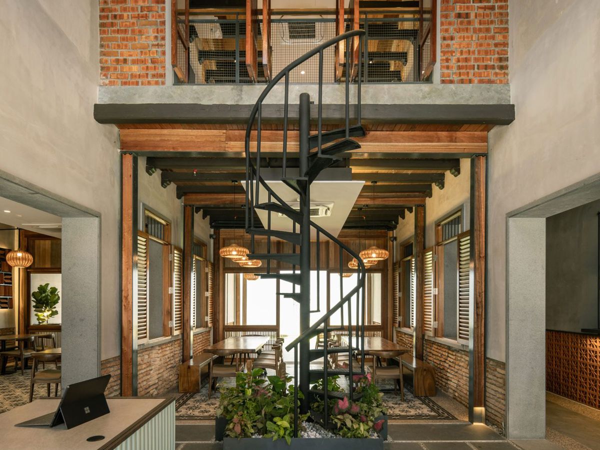 The entrance to Rumah Kechik, showcasing the spiral staircase (Photo: Finbarr Fallon)