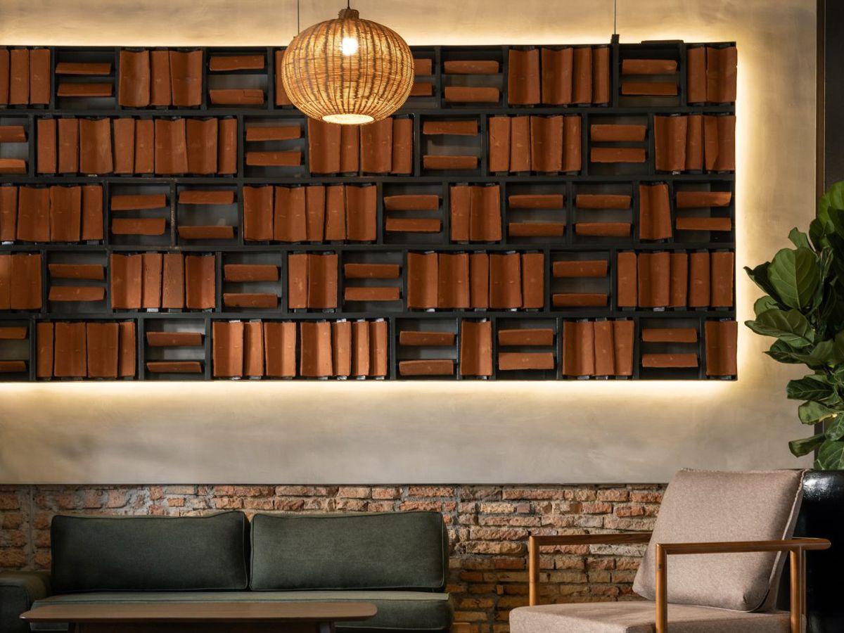 A closer look at the wall fixture consisting of repurposed clay tiles from the original structure (Photo: Finbarr Fallon)