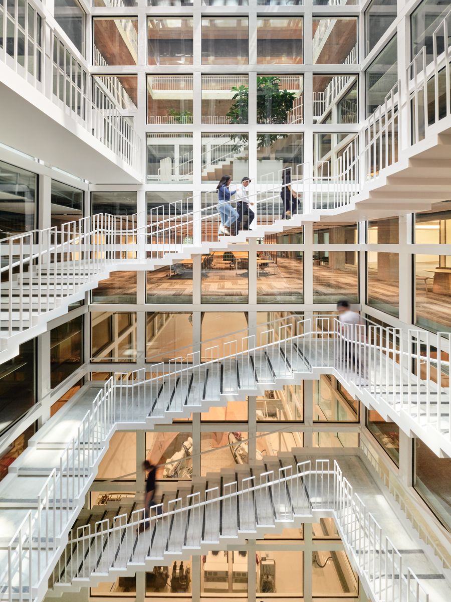 Layering of staircases present in the interior structures of The Gear, creating a sense of interconnectedness between various parts of the building