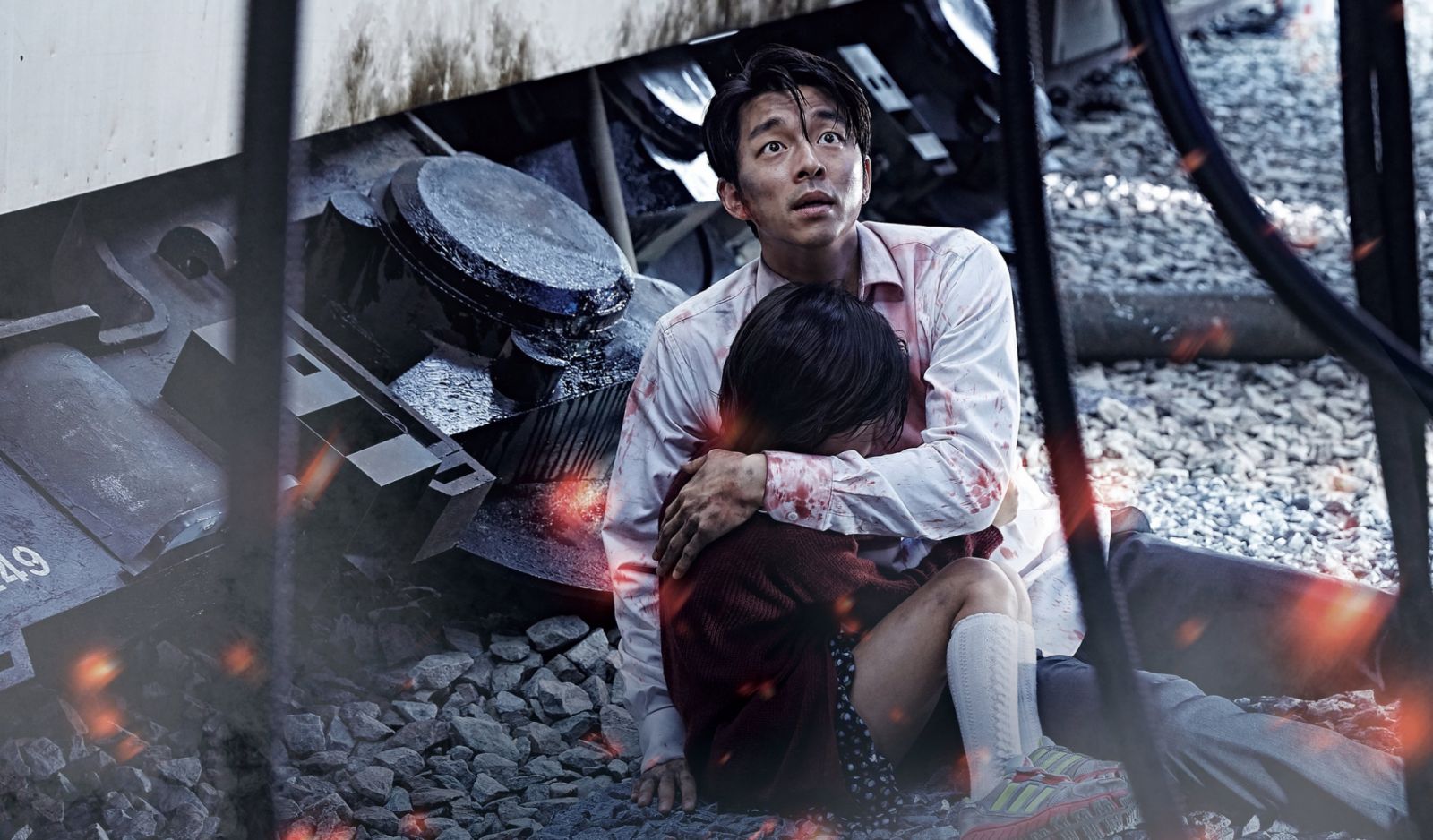 Seok-woo (played by Gong Yoo) and Su-an (played by Kim Su-an) in ‘Train to Busan’