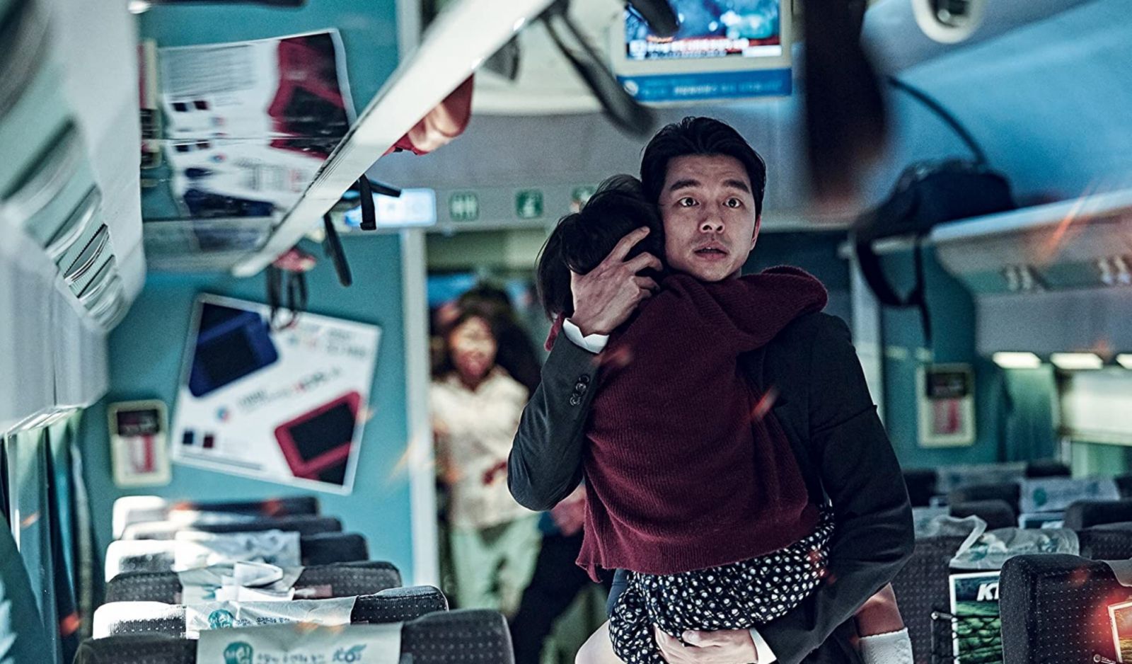 Seok-woo (played by Gong Yoo) and Su-an (played by Kim Su-an) in ‘Train to Busan’
