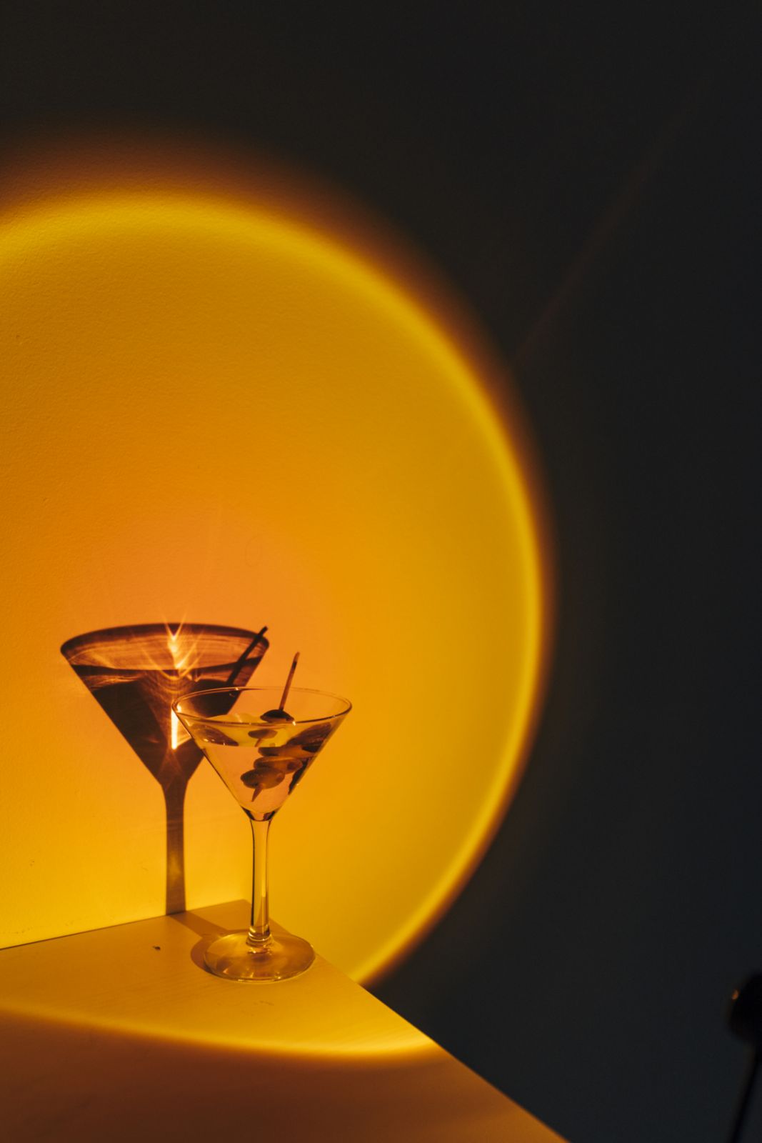 A martini garnished with olives (Photo: Getty Images)