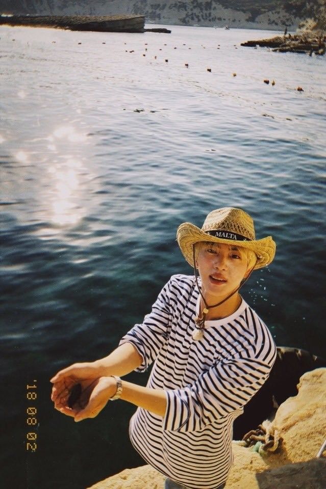 Jin fishing in Malta (image courtesy of X / @bts_bighit)