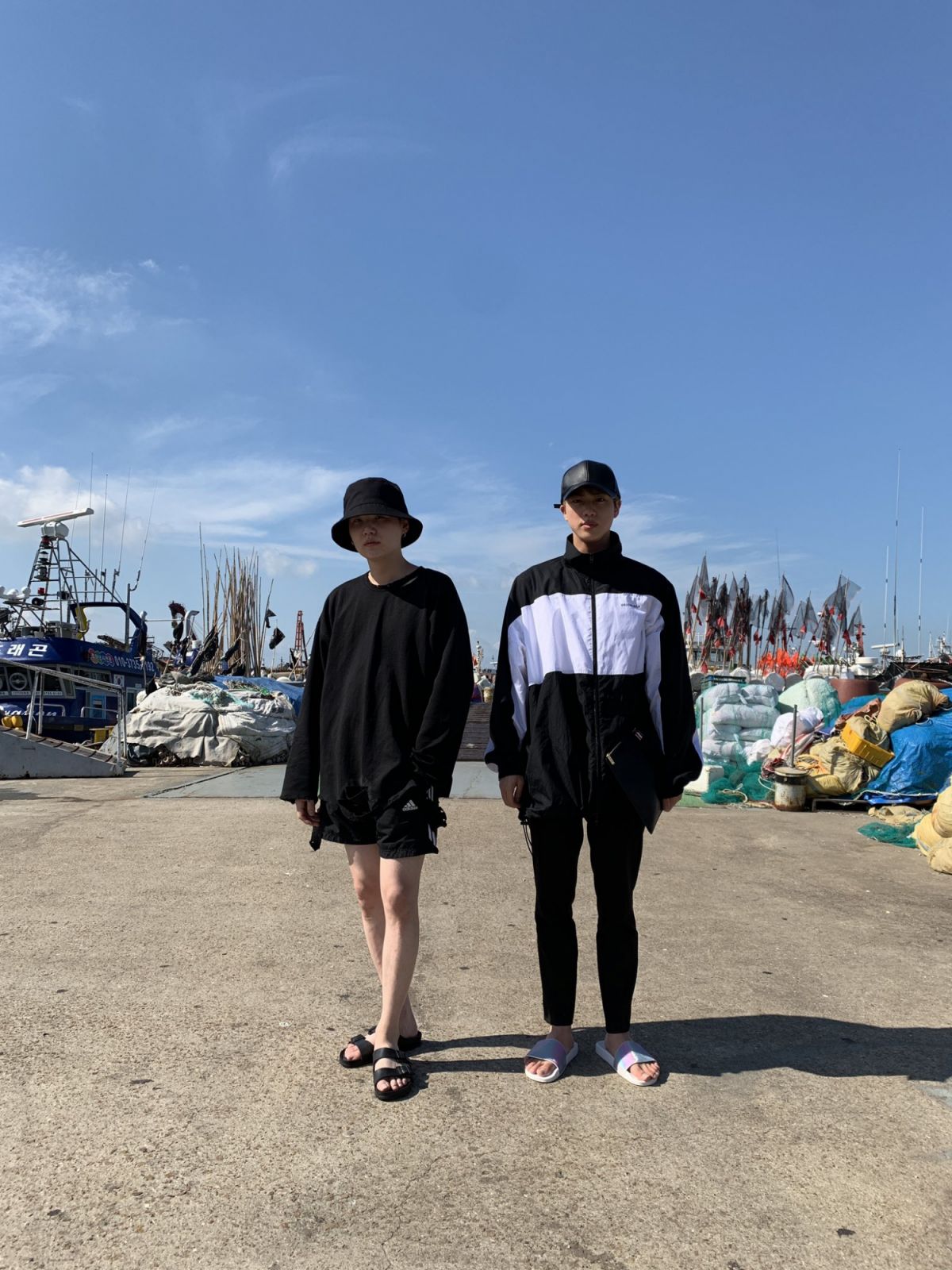 Jin and Suga fishing (image courtesy of X / @bts_bighit)