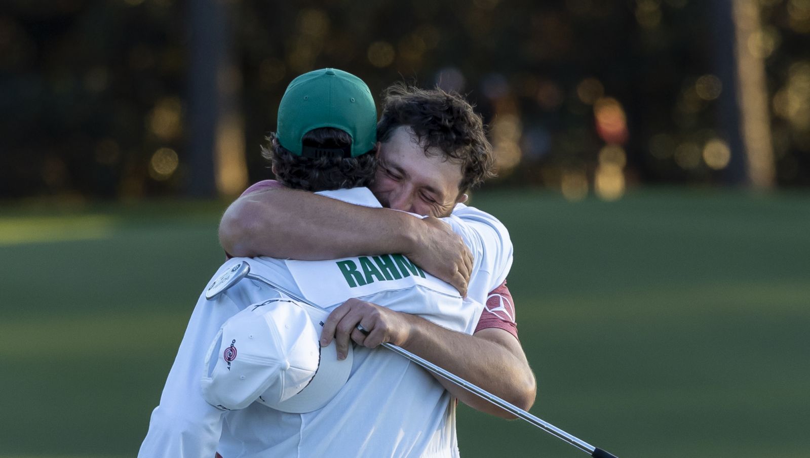 Jon Rahm of Spain reacts on No. 18 with caddie Adam Hayes after winning the 2023 Masters Tournament at Augusta National Golf Club, Sunday, April 9, 2023.