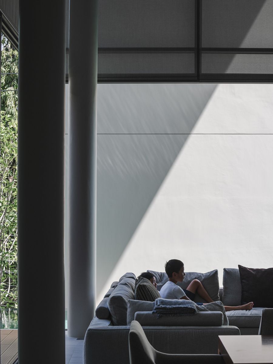 The beloved pool deck is used by the family year-round and for various purposes, such as mealtimes or relaxation