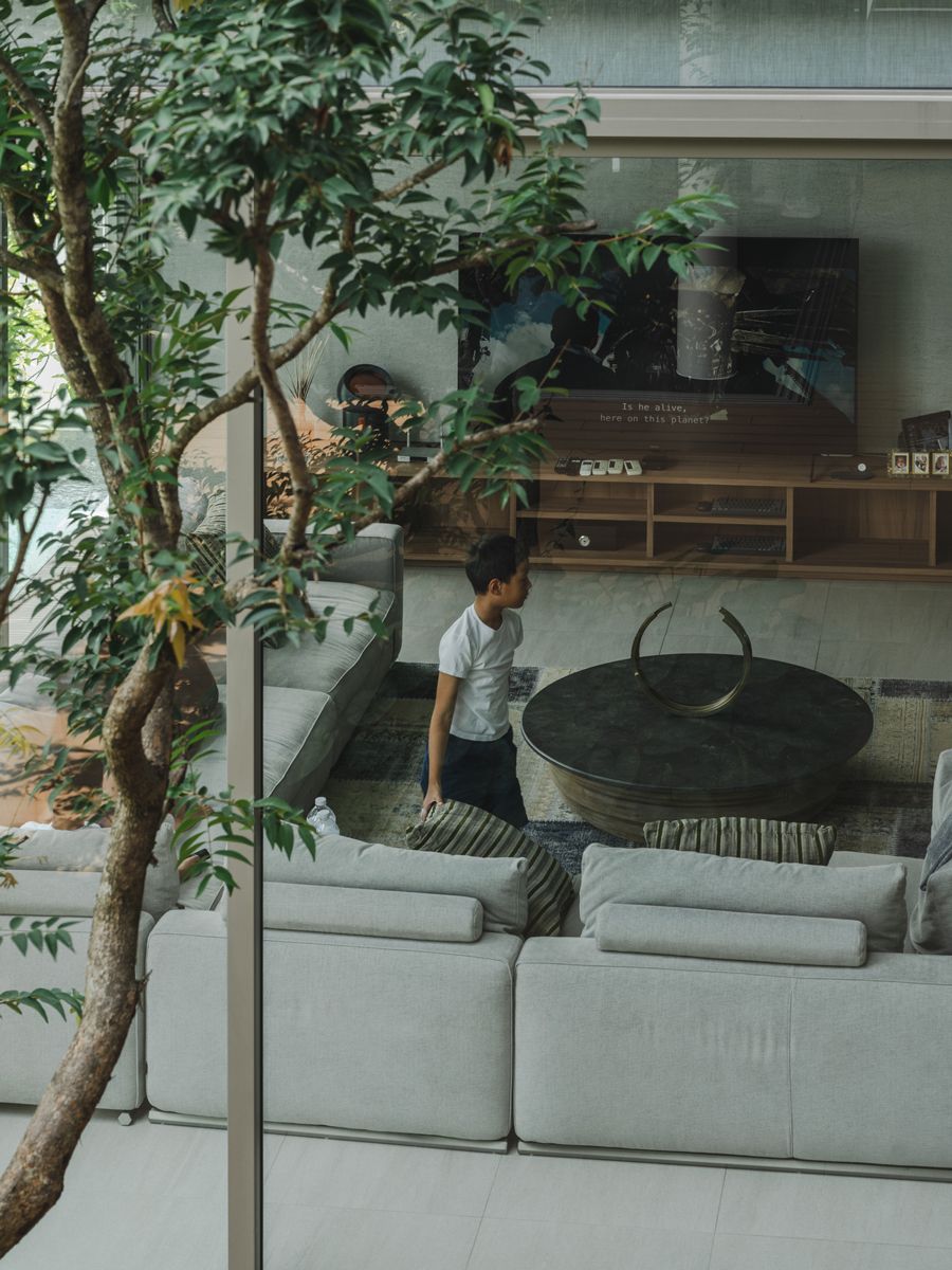 The outdoors is brought indoors with deliberate choices of greenery interspersed throughout the space