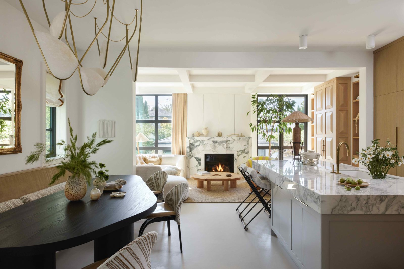 An open floor plan from the living room to the dining and kitchen areas