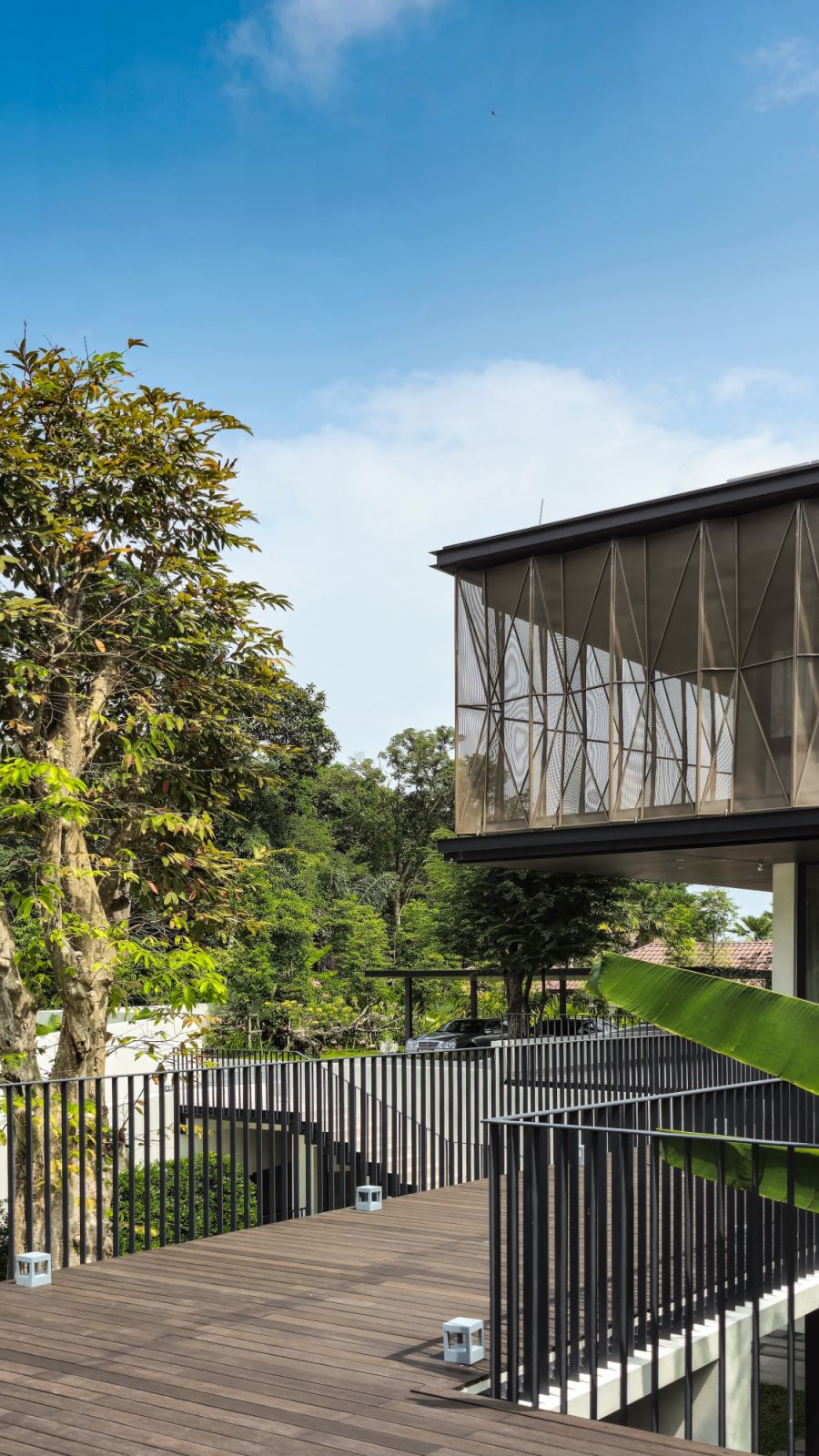 The design adopts a network of deep verandahs, pathways and bridges