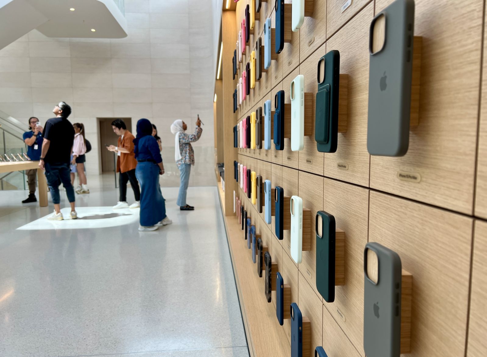 iPhone cases on display at the new Apple The Exchange TRX store