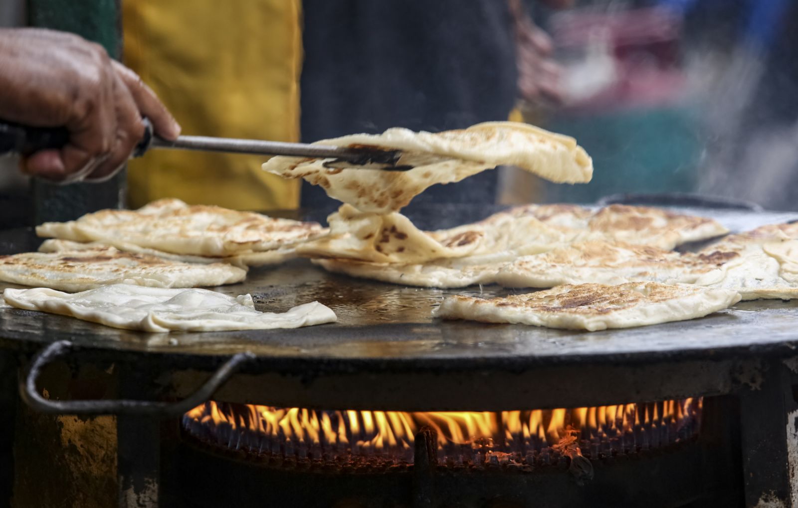 Roti canai being prepared (Photo: Getty Images)