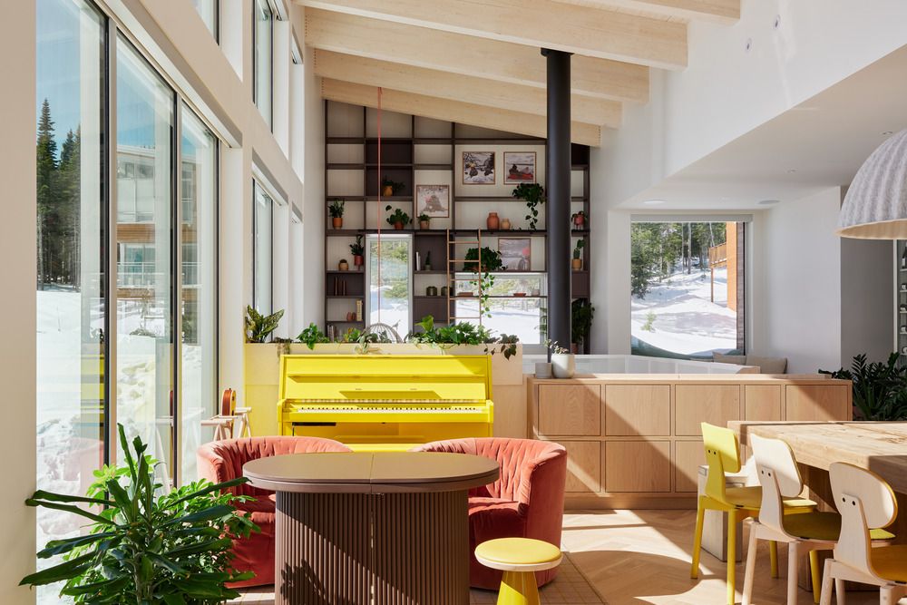 A yellow piano sits in the living room