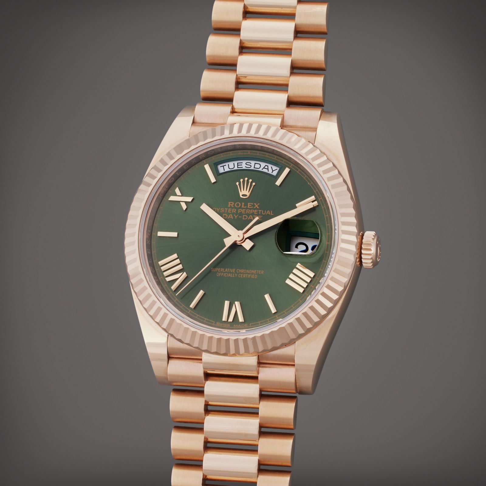 This Rolex Day-Date is engraved with the name “Sly” on the caseback