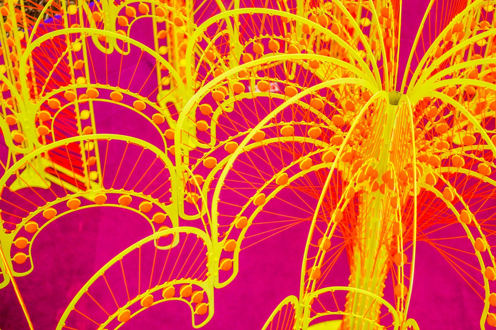 The physical interplay of structure and string depicts the intertwining emotions
