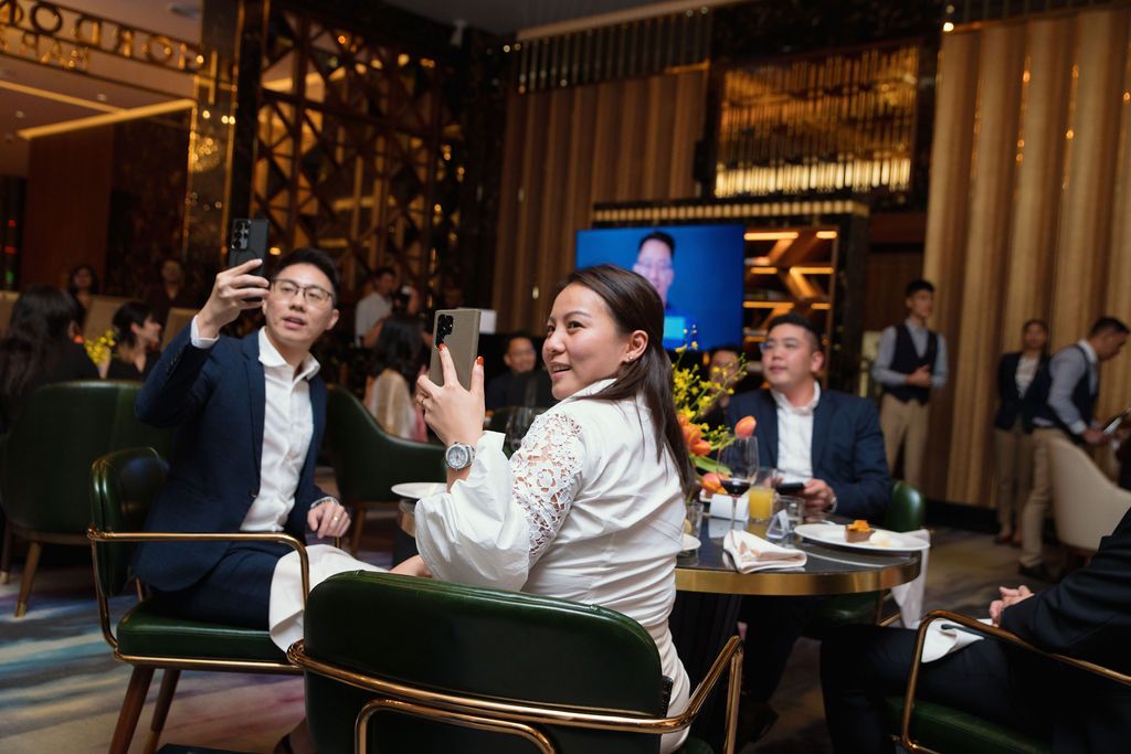 Dick Lim, Lee Hui Jing and Melvin Chee watching as the entire cohort was revealed via a video presentation (Photo: Fady Younis)