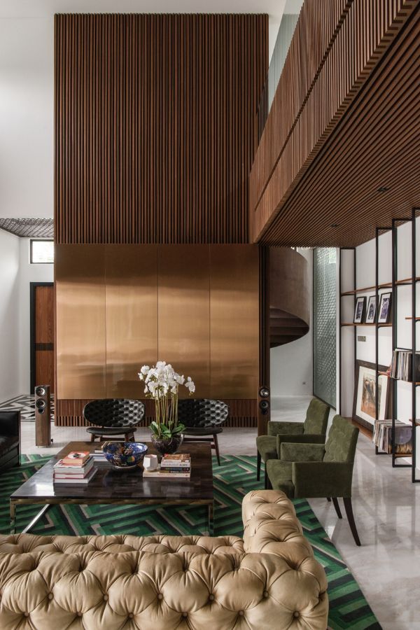 Contrasting materials and colours imbue the living room with the owners’ character (Photo: David Yeow)