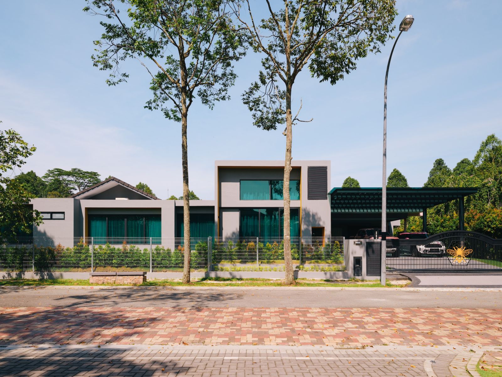 The house stands on a leafy street in Johor Bahru’s Leisure Farm development (Photo: MarcusL Photography)