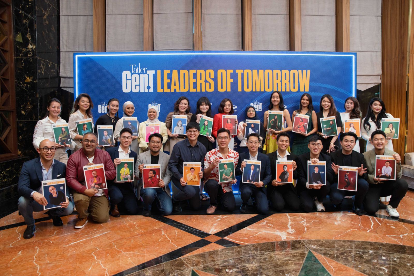 The 2024 cohort of Tatler Gen.T Leaders of Tomorrow from Malaysia with their personalised magazine covers (Photo: Fady Younis)