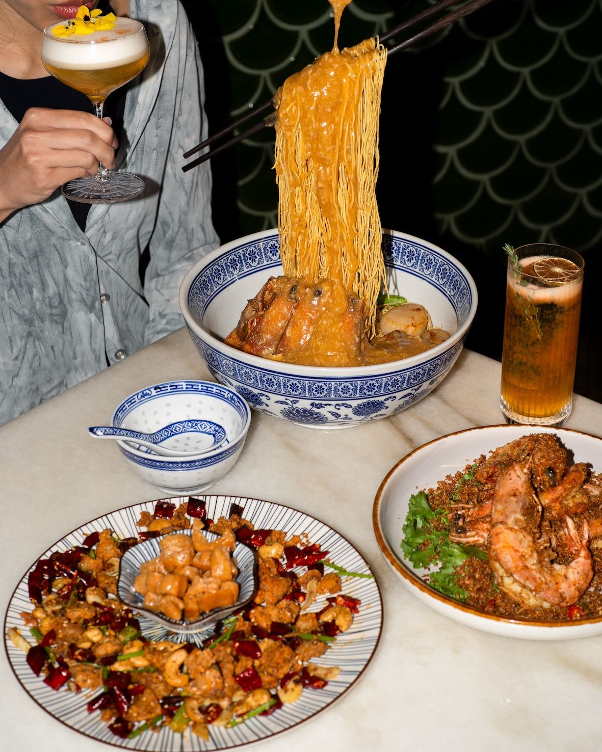Firecracker chicken knees and maple fritters, flying king prawn noodles and Typhoon Shelter King Prawns at The Dragon Chamber
