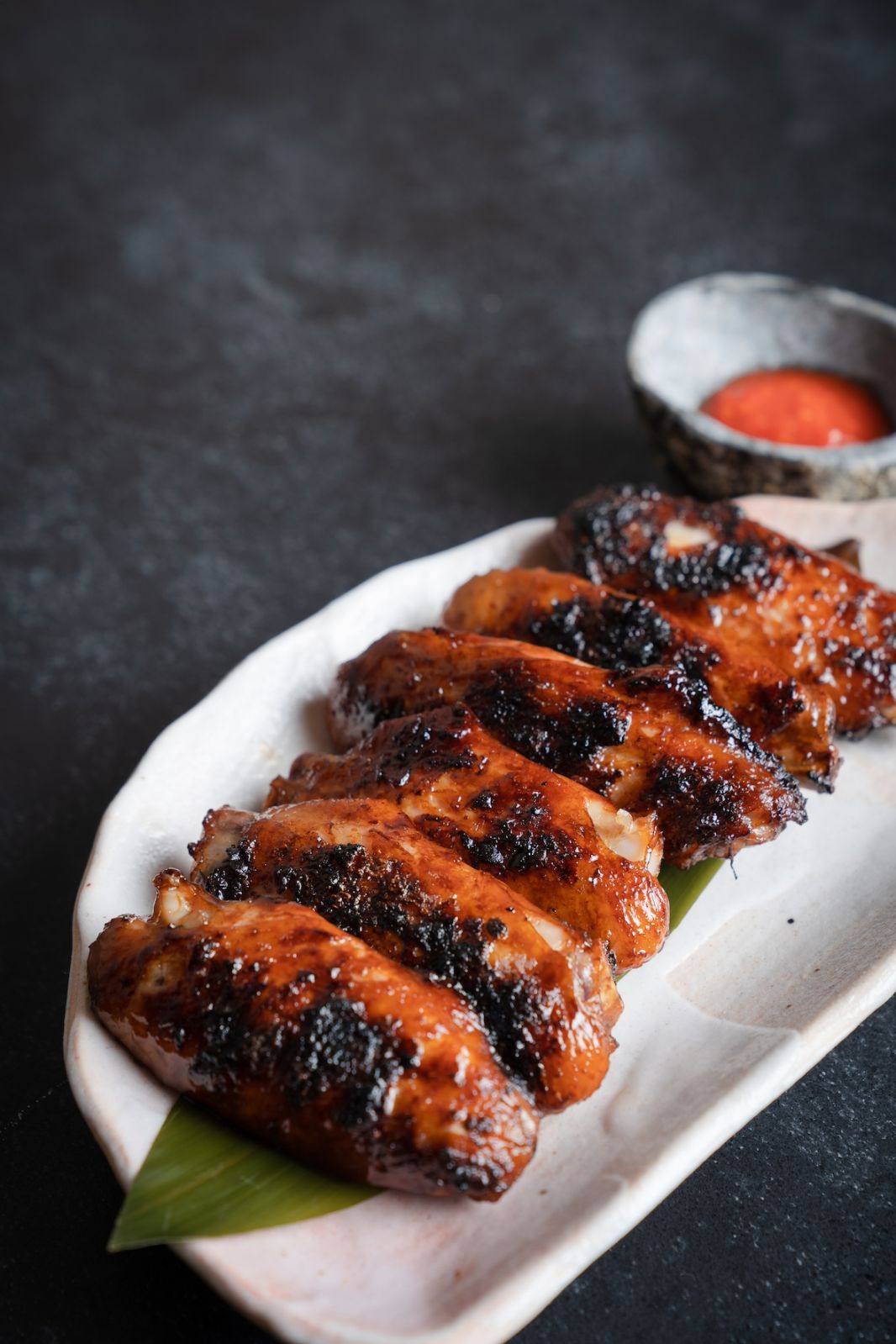 Chargrilled mid-wings at Slate