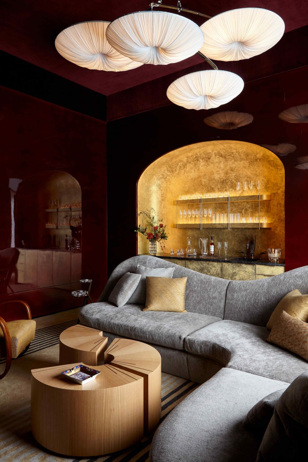 The hammered gold bar in the dark-toned media room