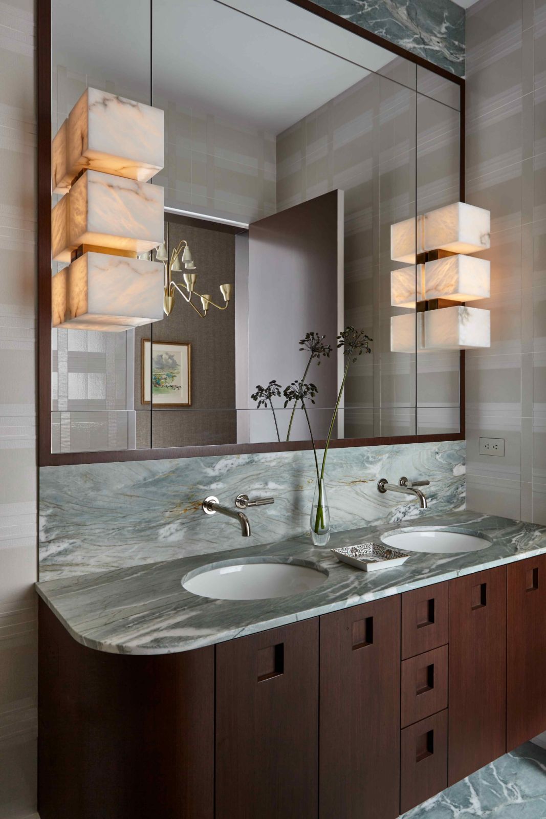 The guest bathroom with soothing alabaster cube shades
