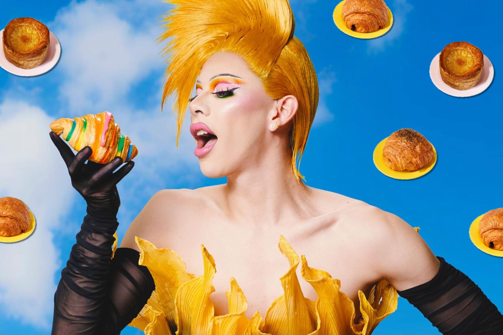 Drag queen Naia Black poses with Butterboy’s Rainbow Croissant for Pride Month. (Photo: Butterboy)