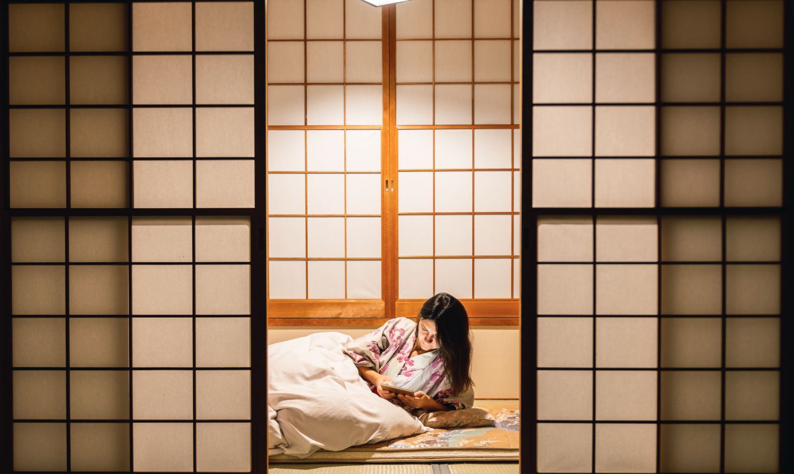 Unwinding among shoji screens (Photo: Marco Bottigelli / Getty Images)