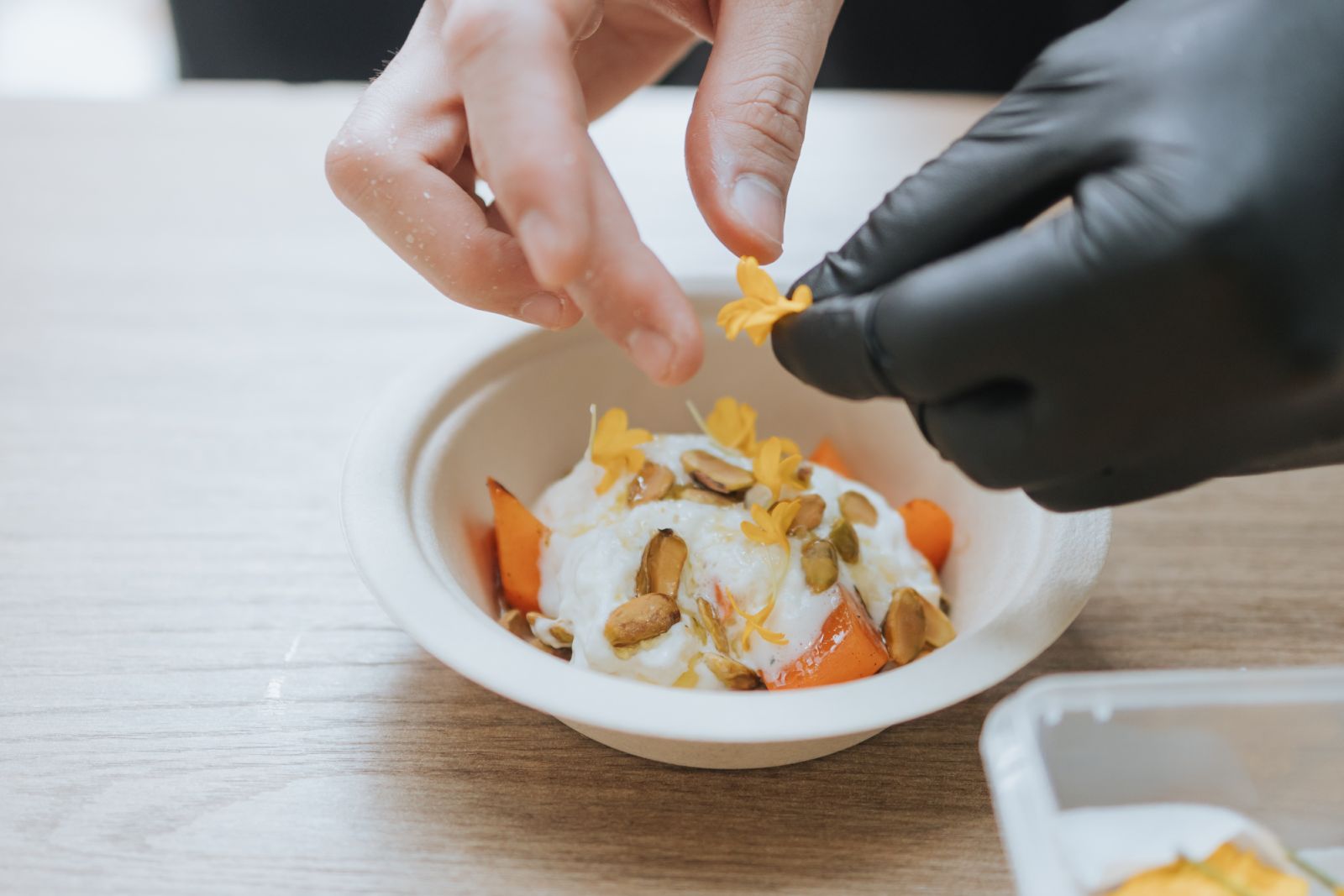 A dish being garnished at last year’s Big Sunday Barbecue (Photo: Kita Food Festival)