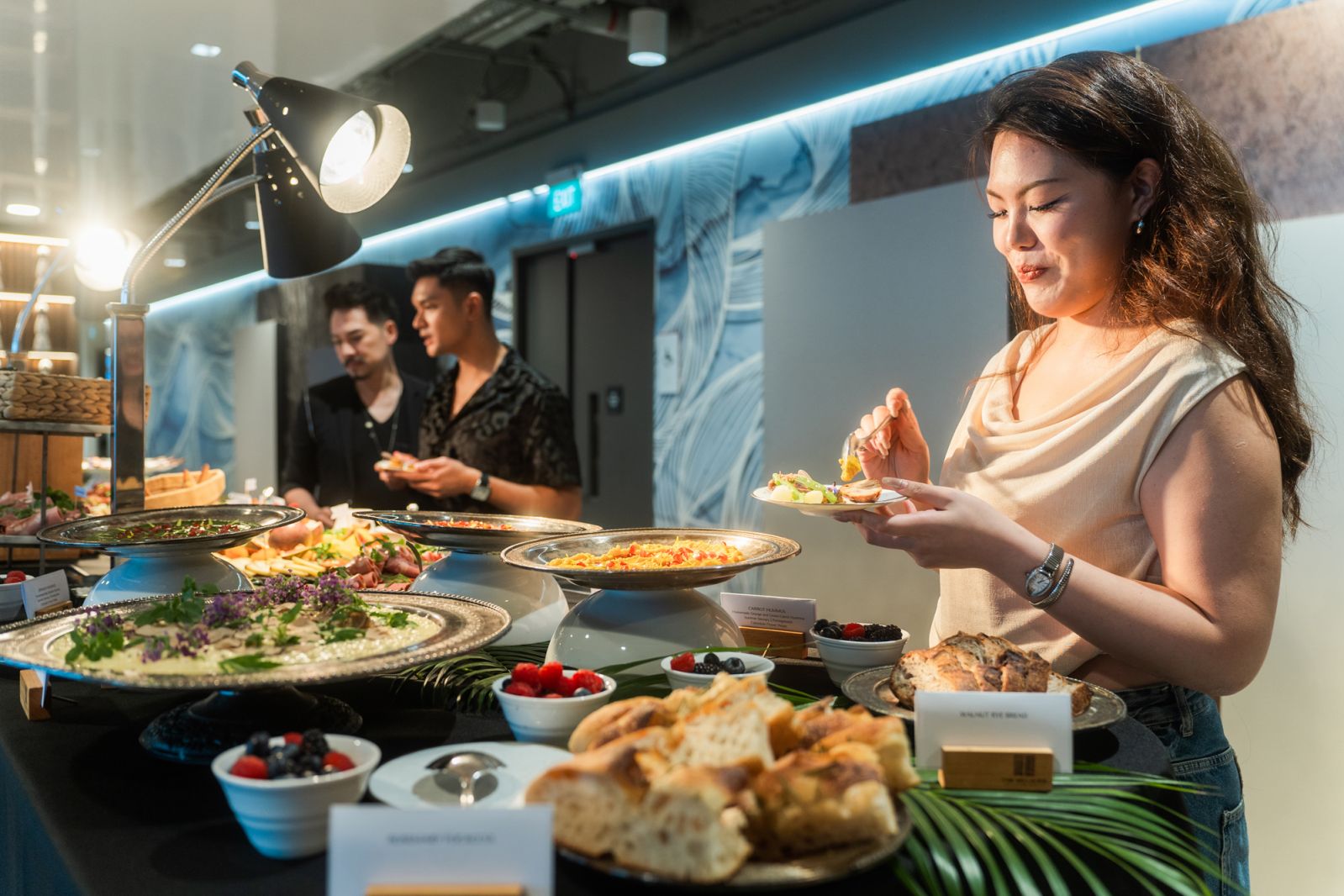 Guests mingled and indulged in a premium assortment of cheeses, cold cuts and other delicacies