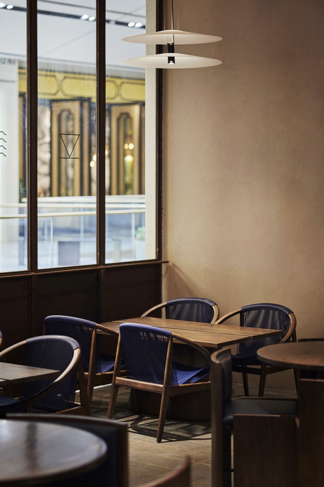 Nestle into comfortable dining areas (Photo: Okokon Studio)
