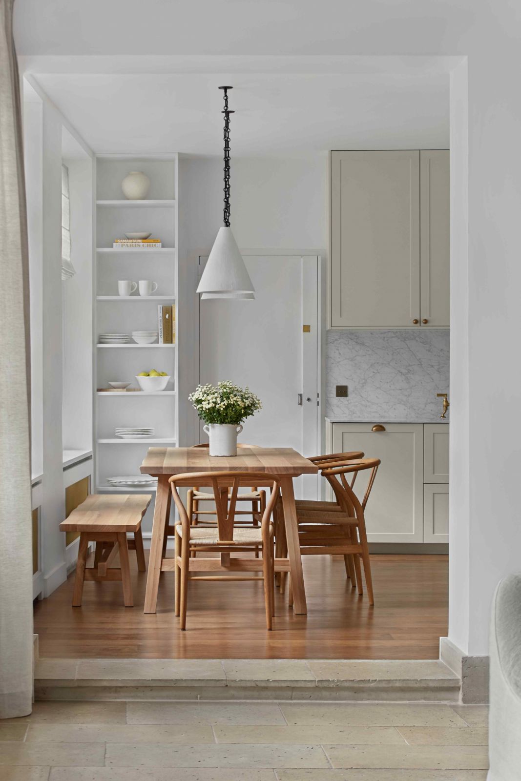 Solid oak wood flooring replaces the previous terracotta tiles