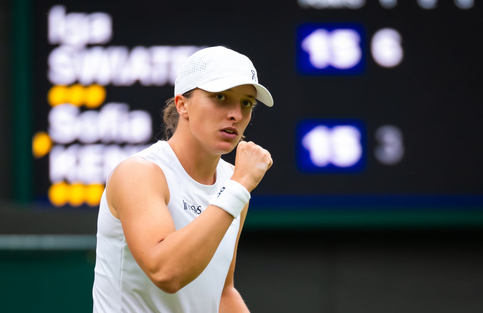 Iga Swiatek of Poland in action against Sofia Kenin of the United States in the first round on Day Two of The Championships Wimbledon 2024 (Photo by Robert Prange/Getty Images)