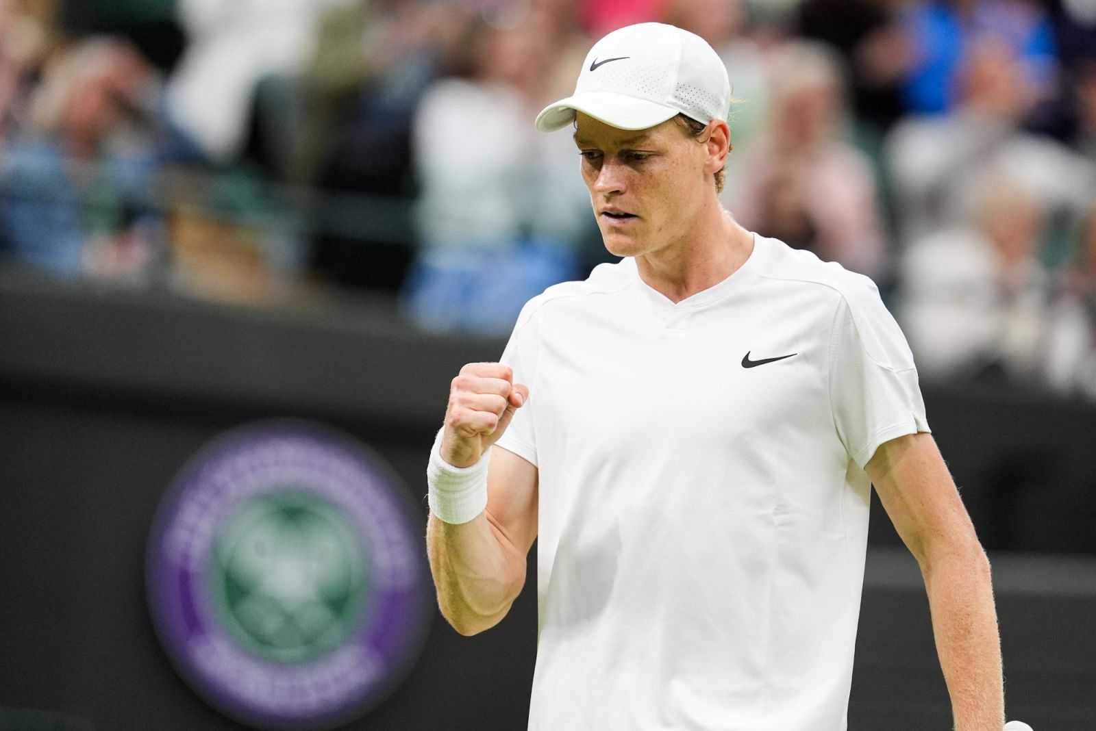 Jannik Sinner of Italy reacts in the Men's Singles first round match against Yannick Hanfmann of Germany during day one of The Championships Wimbledon 2024 (Photo by Shi Tang/Getty Images)