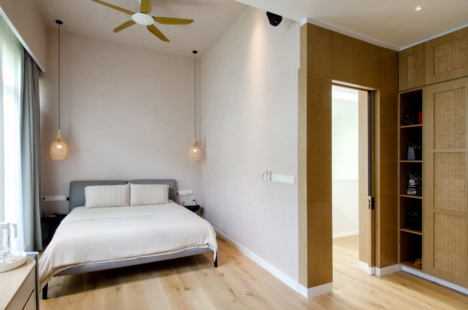 Light materials are showcased in the bedrooms