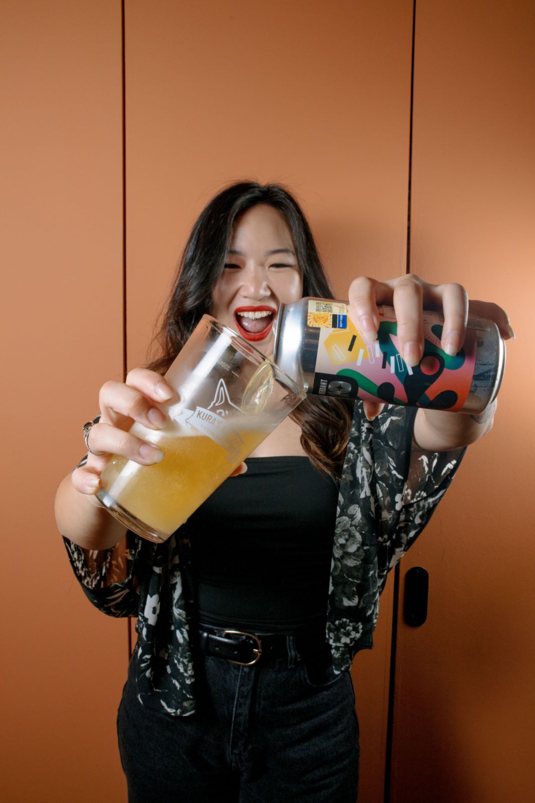 Lim pouring a craft beer