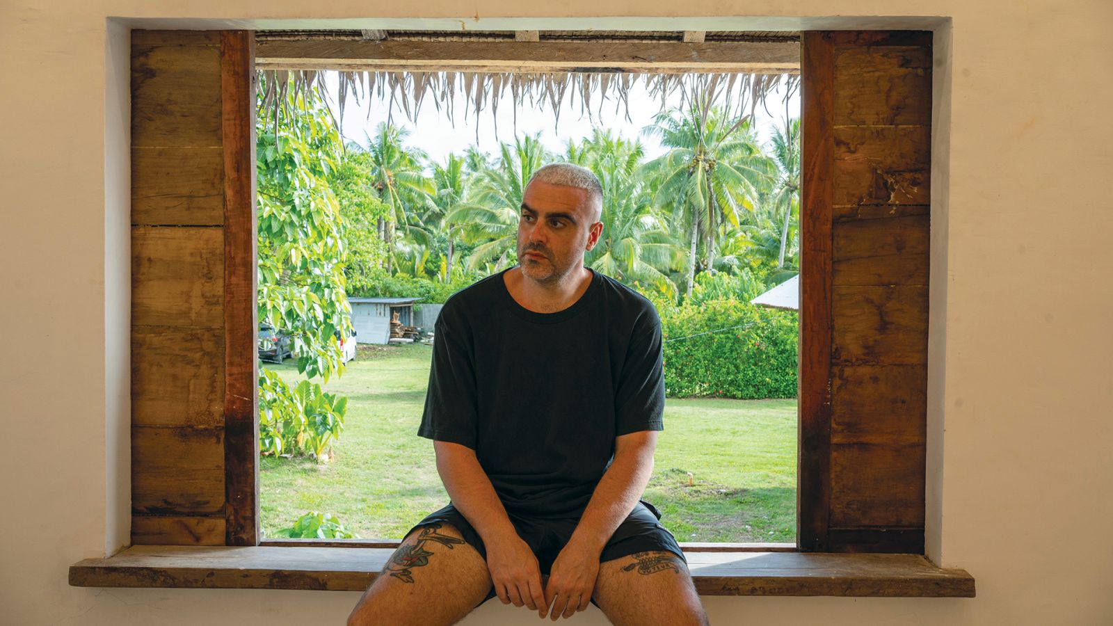 Stefano Serretta sitting on the window