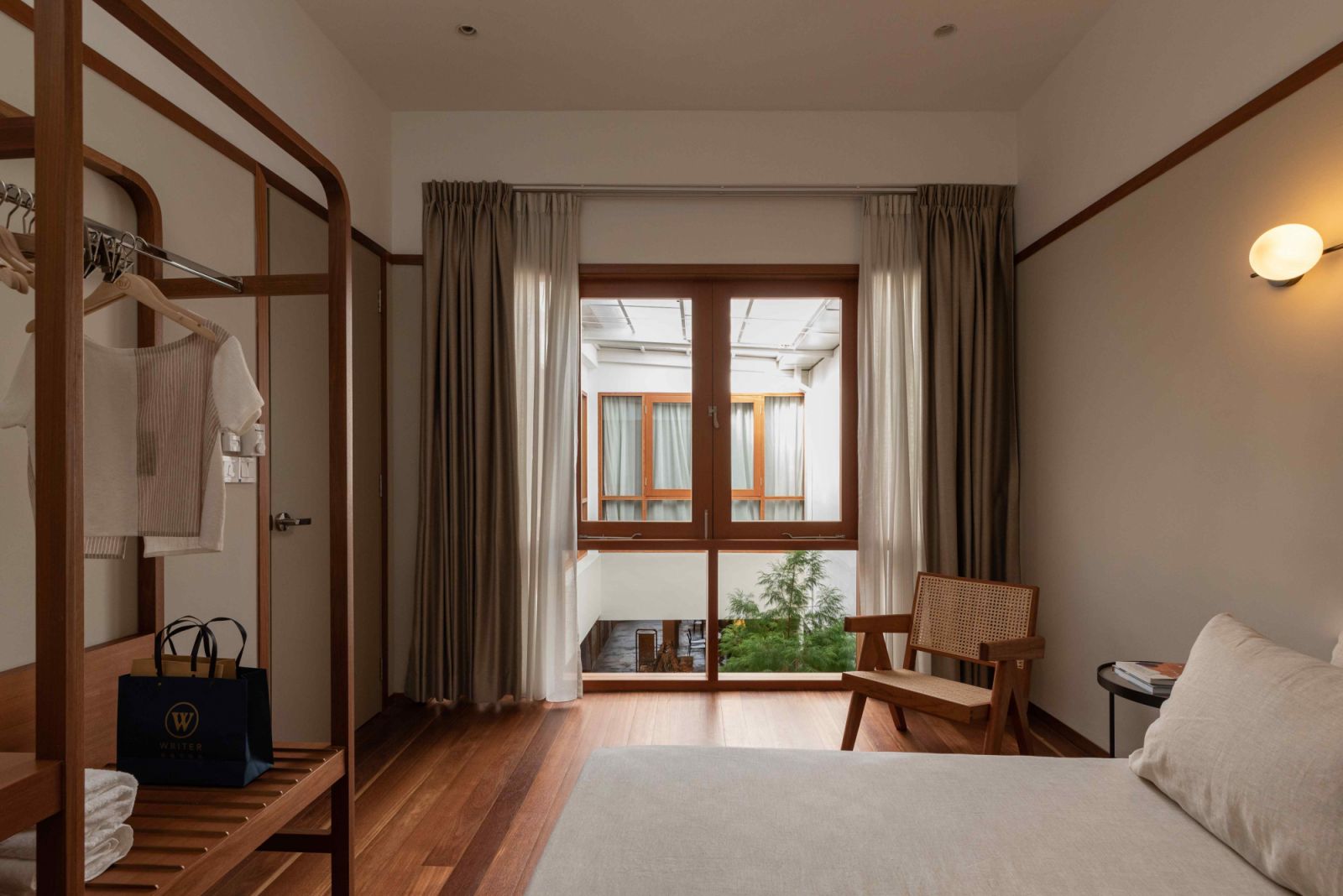 The Bradbury Room overlooks the heritage shophouse’s inner air well (Photo: TWJPTO / Courtesy of Slow Life)