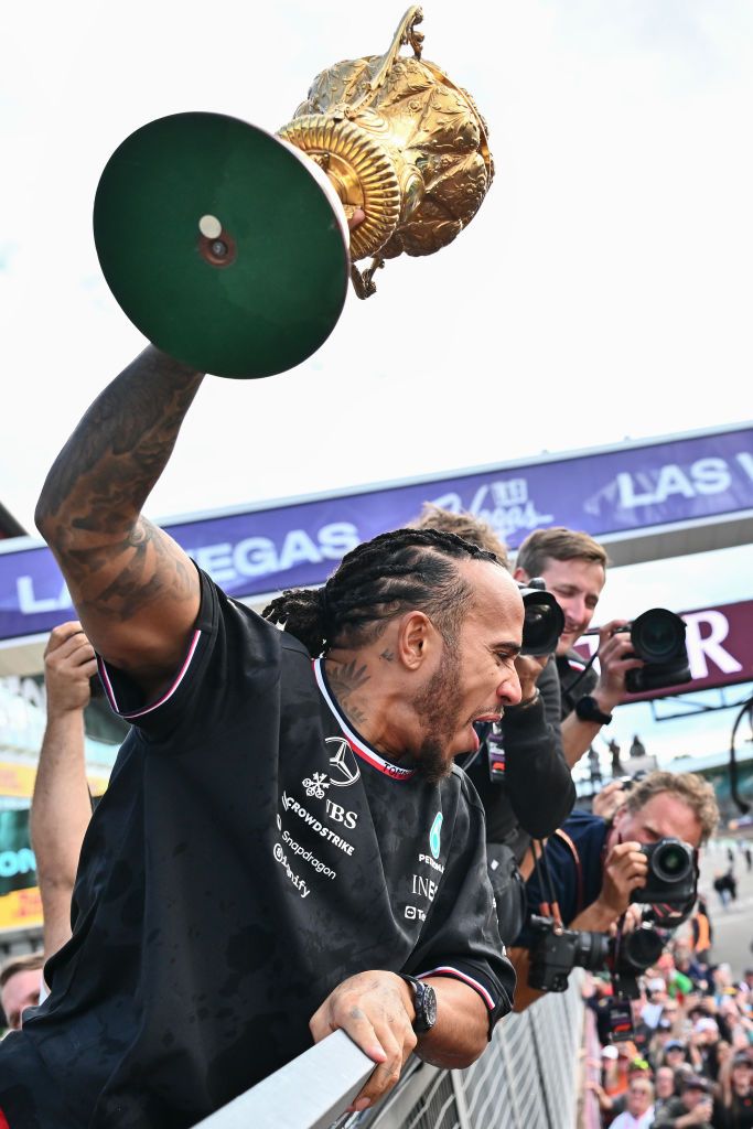 NORTHAMPTON, ENGLAND - JULY 7: Lewis Hamilton of Great Britain and Mercedes-AMG PETRONAS F1 Team celebrates his win with the fans during the F1 Grand Prix of Great Britain at Silverstone Circuit on July 7, 2024 in Northampton, England.(Photo by Vince Mignott/MB Media/Getty Images)