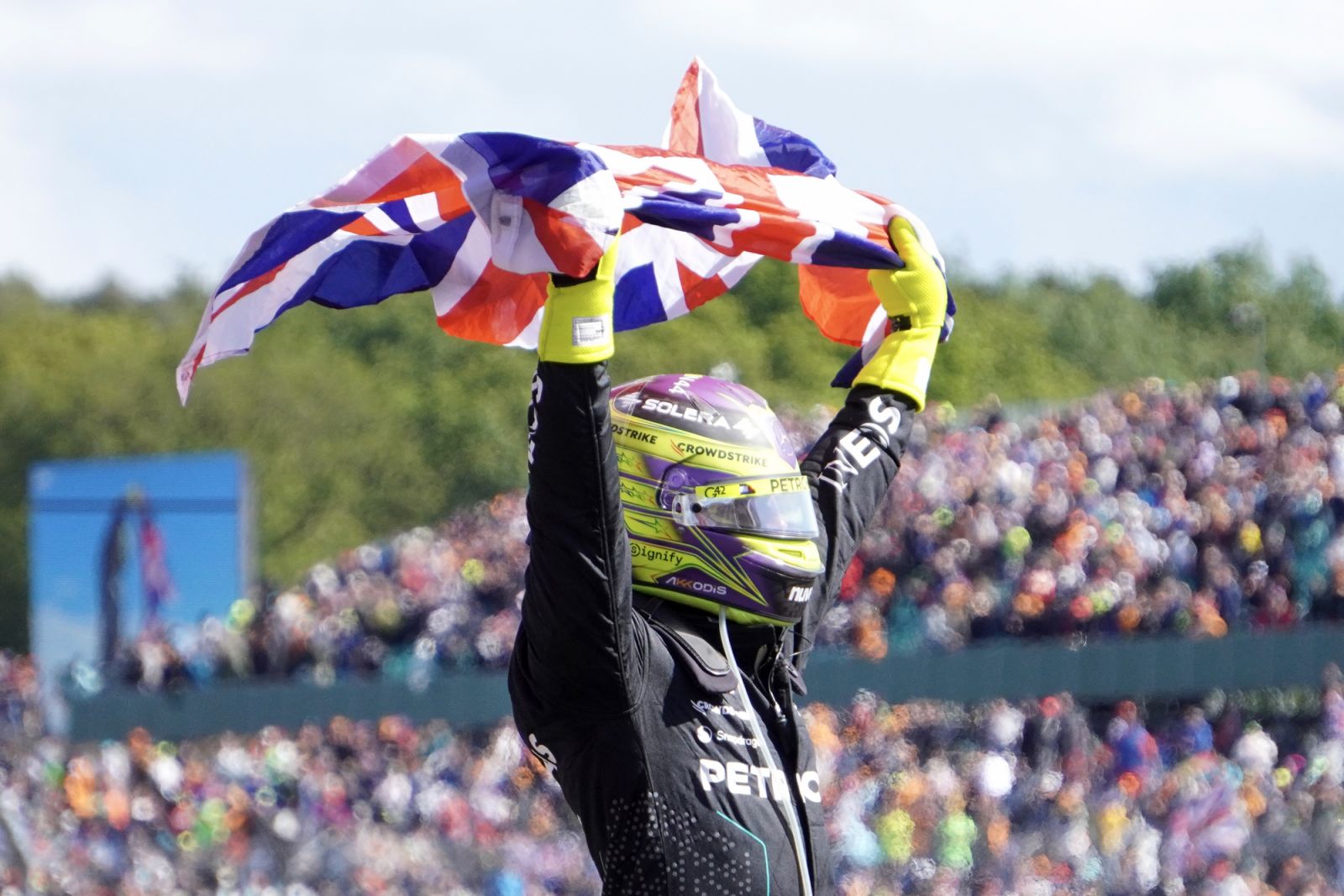 Mercedes' Lewis Hamilton celebrates winnig the race at Silverstone Circuit, Northamptonshire. Picture date: Sunday July 7, 2024. (Photo by Matthew Vincent/PA Images via Getty Images)