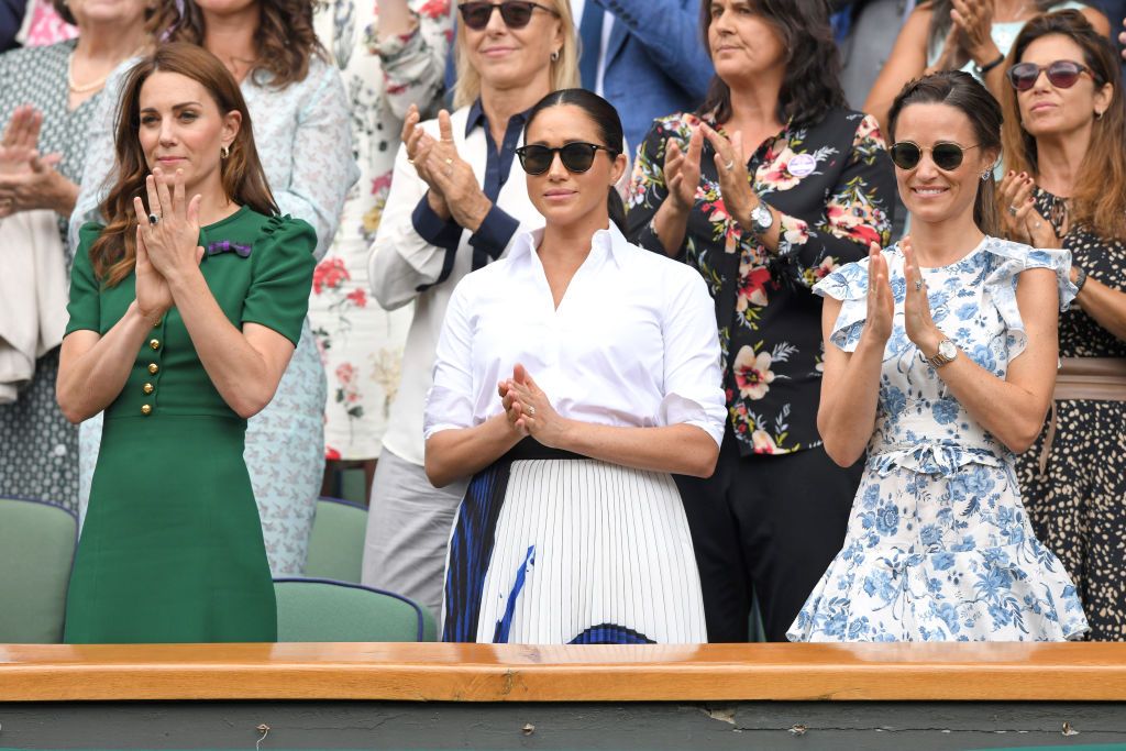 LONDON, ENGLAND - JULY 13: Catherine, Duchess of Cambridge, Meghan, Duchess of Sussex and Pippa Middleton in the Royal Box on Centre Court during day twelve of the Wimbledon Tennis Championships at All England Lawn Tennis and Croquet Club on July 13, 2019 in London, England. (Photo by Karwai Tang/Getty Images)