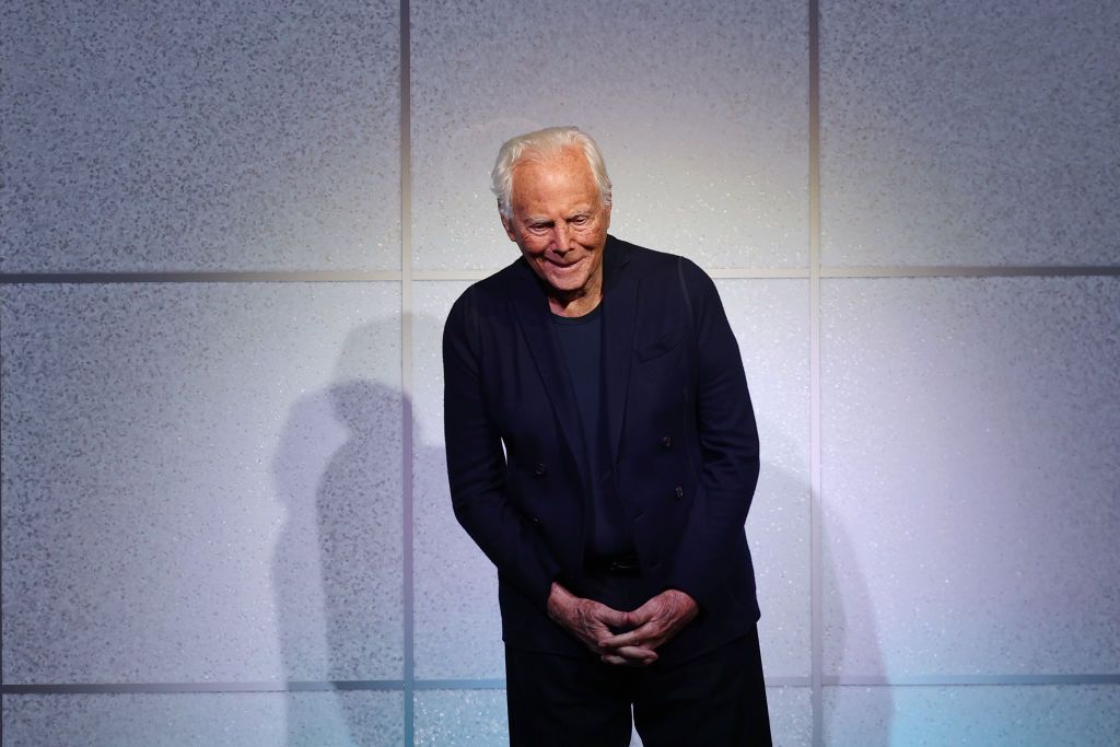 MILAN, ITALY - FEBRUARY 25: Fashion designer Giorgio Armani acknowledges the applause of the audience at the Giorgio Armani fashion show during the Milan Fashion Week Womenswear Fall/Winter 2024-2025 on February 25, 2024 in Milan, Italy. (Photo by Vittorio Zunino Celotto/Getty Images)