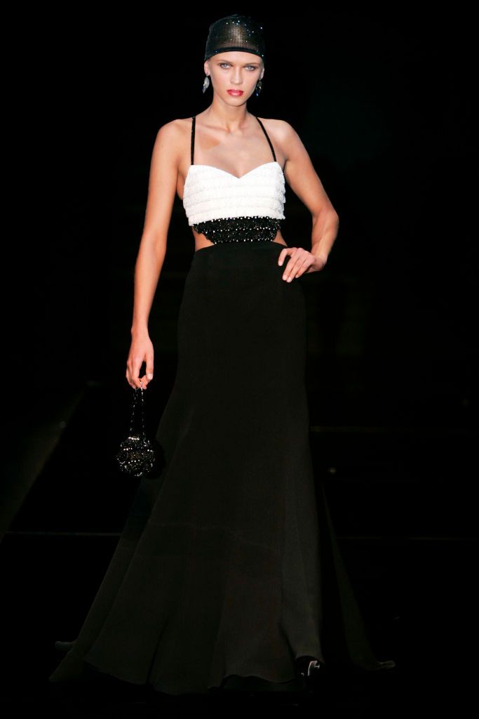PARIS, FRANCE - JANUARY 23: A model walks the runway during the Armani Privé Haute Couture Spring/Summer 2004 fashion show as part of the Paris Haute Couture Fashion Week on January 23, 2005 in Paris, France. (Photo by Victor VIRGILE/Gamma-Rapho via Getty Images)