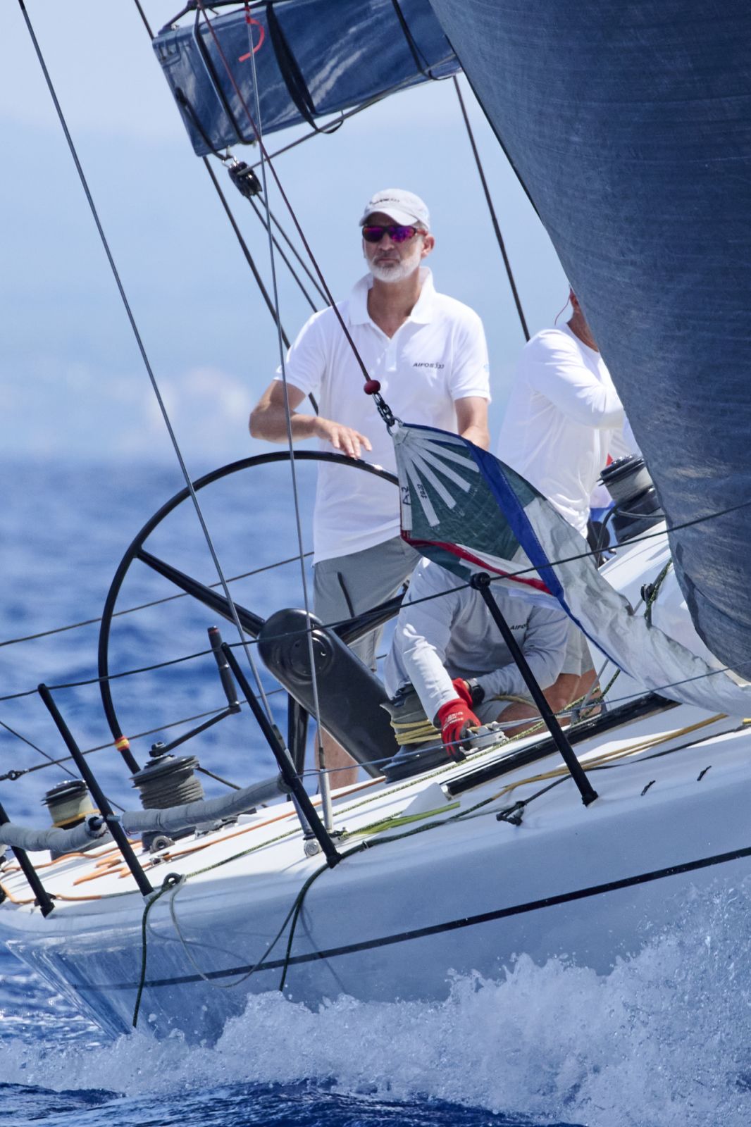 PALMA DE MALLORCA, SPAIN - AUGUST 02: King Felipe VI of Spain competes on board the boat Aifos, during the 41th Copa Del Rey Mapfre Sailing Cup (King's Cup) at the Real Club Nautico on August 02, 2023 in Palma de Mallorca, Spain. (Photo by Carlos Alvarez/Getty Images)
