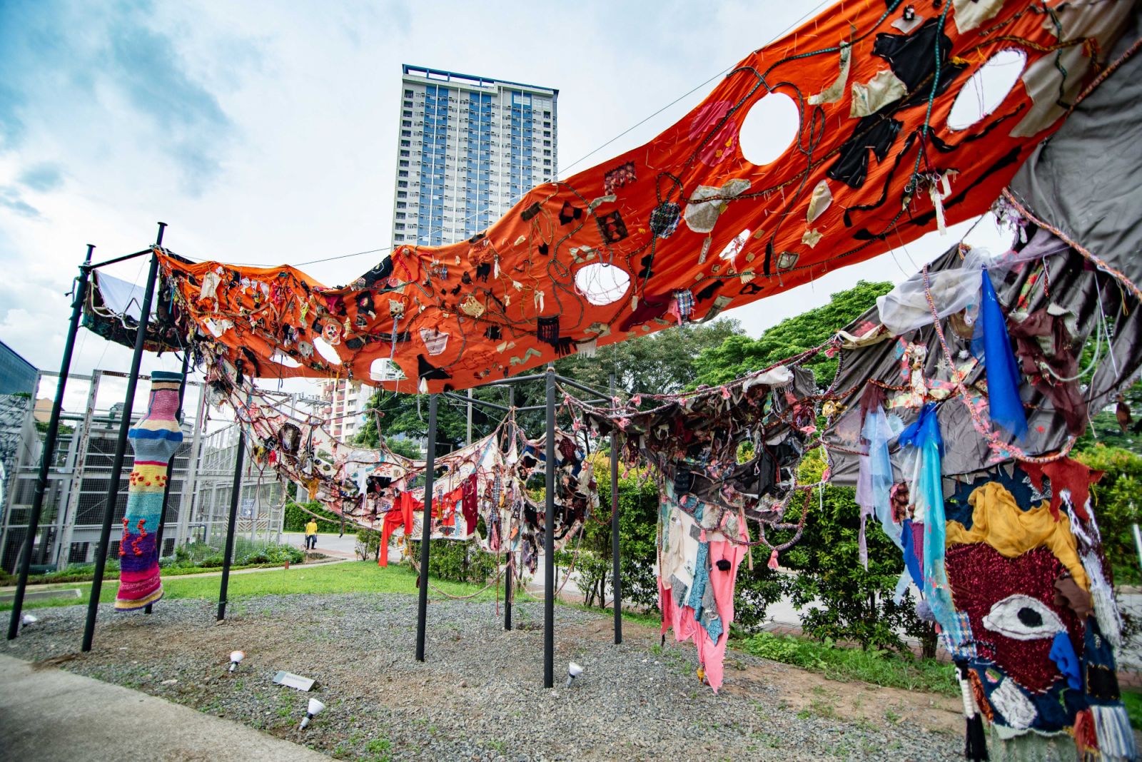 The holes and openings as part of its design, invite viewers to focus on the light coming from above as they look up towards the sky, symbolizing hope against the difficulties and challenges in today’s societies.