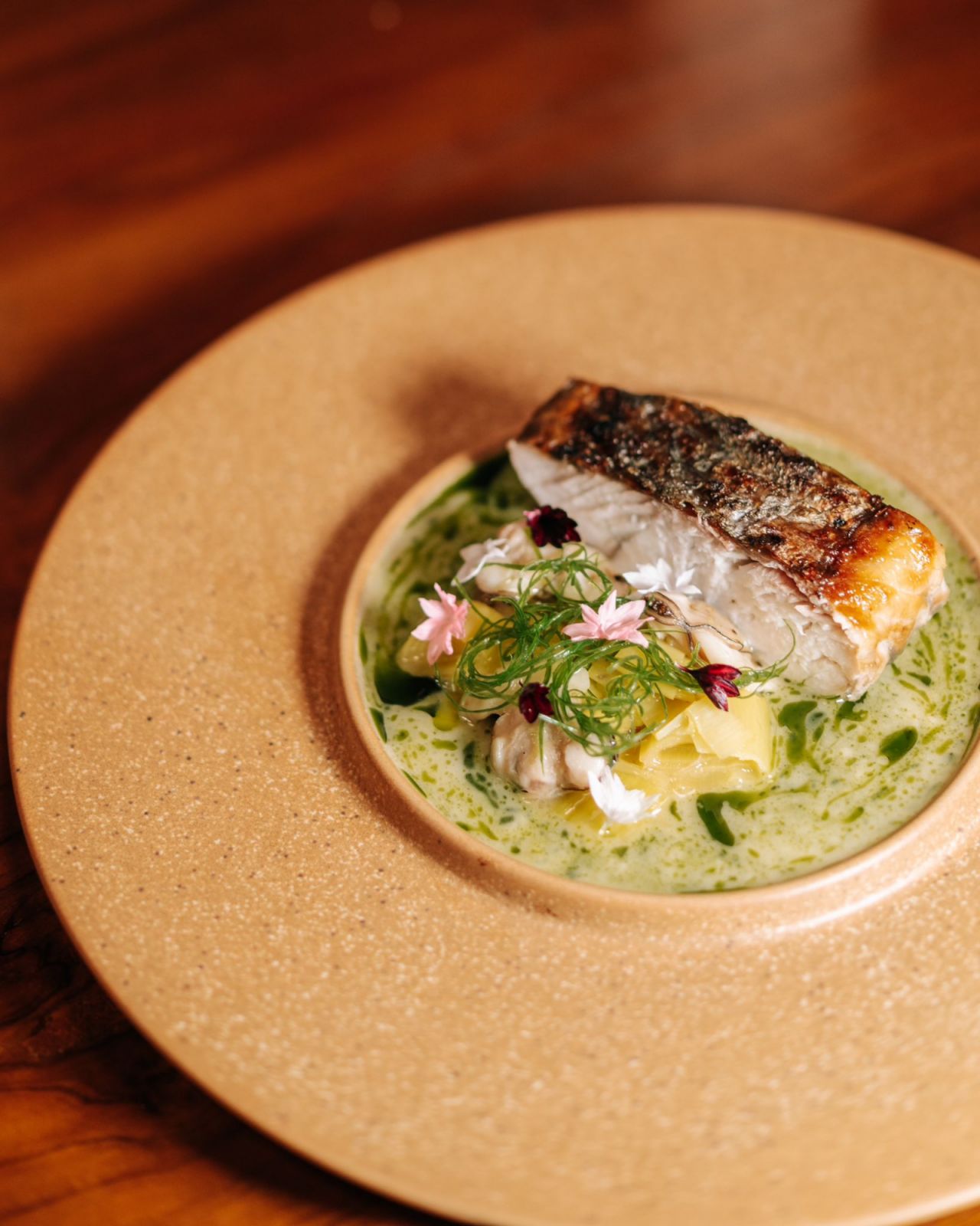 Province's barramundi that features aged seabass and smoked mussel jus