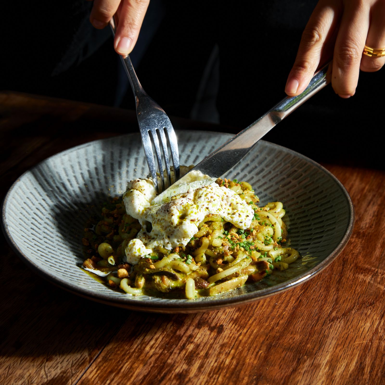 Cenzo's deliciously creamy gramigna cooked in pistachio pesto and mushrooms