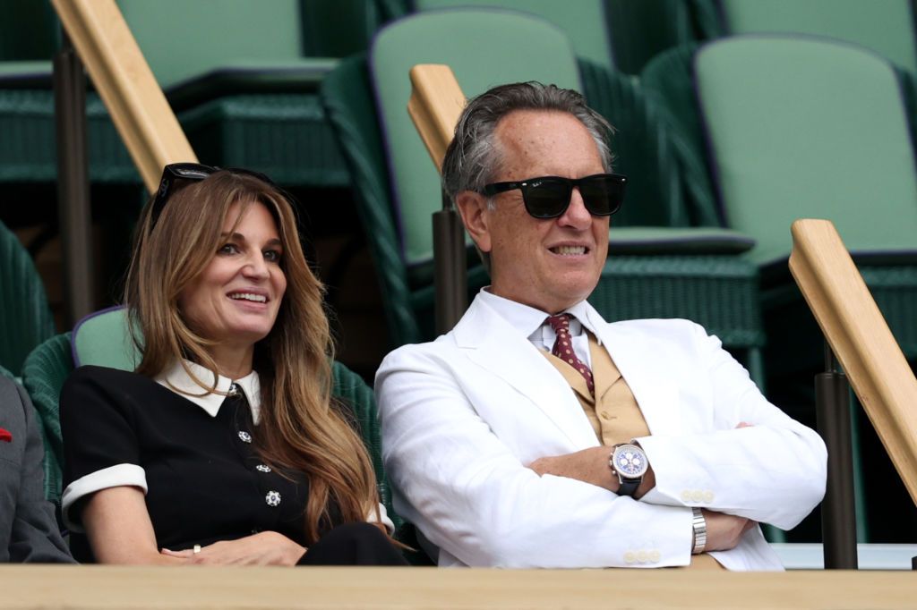 LONDON, ENGLAND - JULY 10: Richard E. Grant and Jemima Khan talk in the Royal Box during day ten of The Championships Wimbledon 2024 at All England Lawn Tennis and Croquet Club on July 10, 2024 in London, England. (Photo by Clive Brunskill/Getty Images)