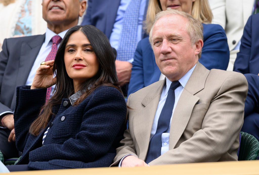 LONDON, ENGLAND - JULY 07: Salma Hayek and François-Henri Pinault attend day seven of the Wimbledon Tennis Championships at the All England Lawn Tennis and Croquet Club on July 07, 2024 in London, England. (Photo by Karwai Tang/WireImage)