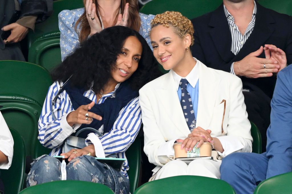 LONDON, ENGLAND - JULY 08: Chioma Nnadi and Nathalie Emmanuel attend day eight of the Wimbledon Tennis Championships at the All England Lawn Tennis and Croquet Club on July 08, 2024 in London, England. (Photo by Karwai Tang/WireImage)